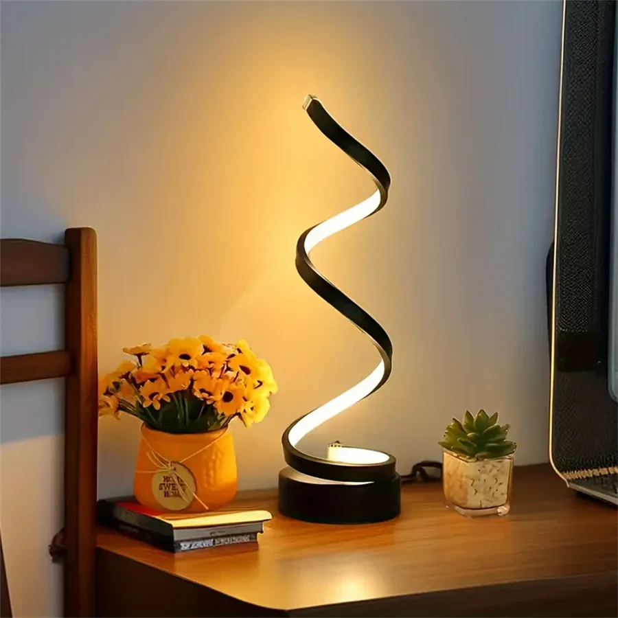 Modern spiral LED table lamp for desk and home lighting decor.