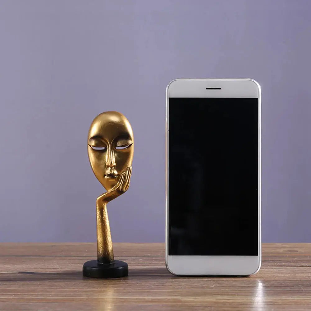 Exquisite resin face art statue for modern home decor and interior design.