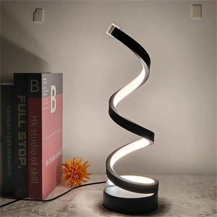 Modern spiral LED table lamp for desk and home lighting decor.