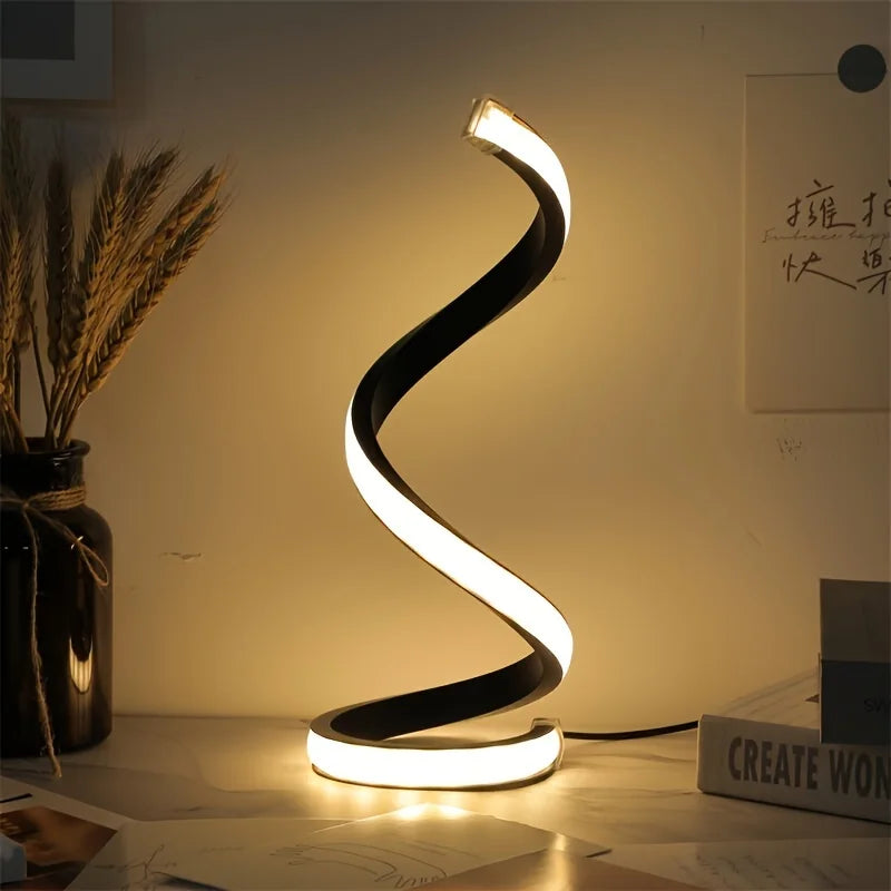 Modern spiral LED table lamp for desk and home lighting decor.