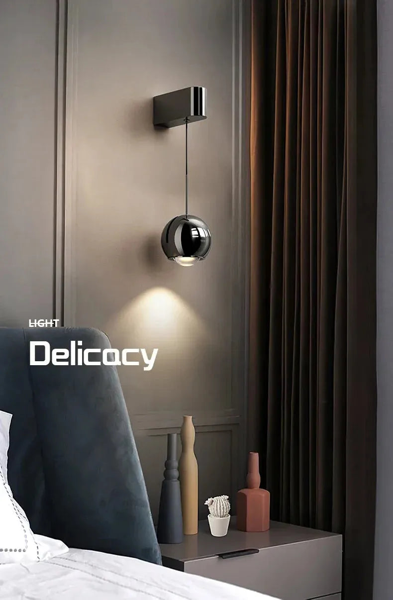 Modern adjustable LED bedside wall lamp for bedroom lighting and decor.