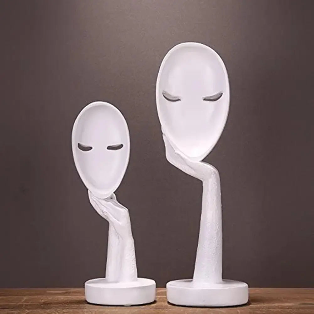 Exquisite resin face art statue for modern home decor and interior design.