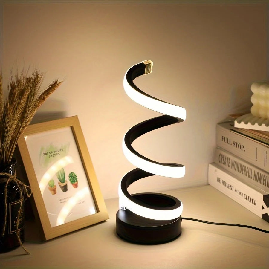 Modern spiral LED table lamp for desk and home lighting decor.