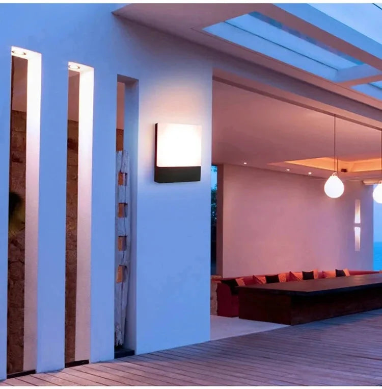 Minimalist ultra-bright outdoor waterproof wall lamp for garden and exterior lighting.