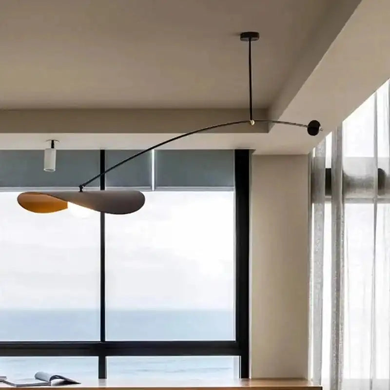 Modern minimalist LED pendant light for home interior lighting and ceiling decor.