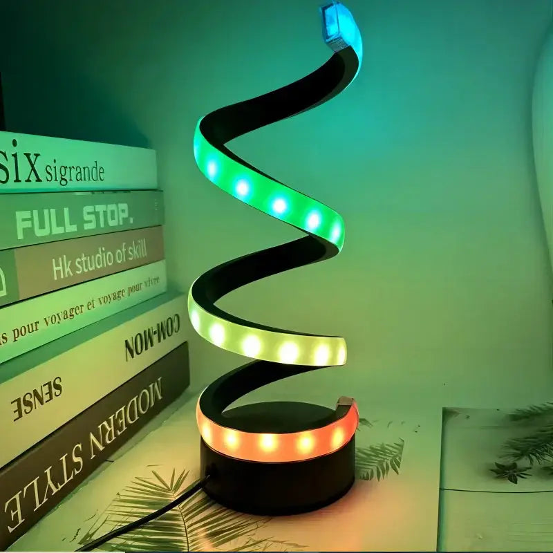 Modern dimmable spiral LED table lamp for desk and home lighting.
