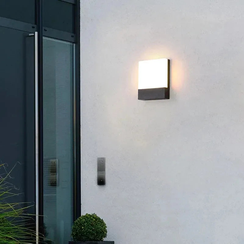 Minimalist ultra-bright outdoor waterproof wall lamp for garden and exterior lighting.