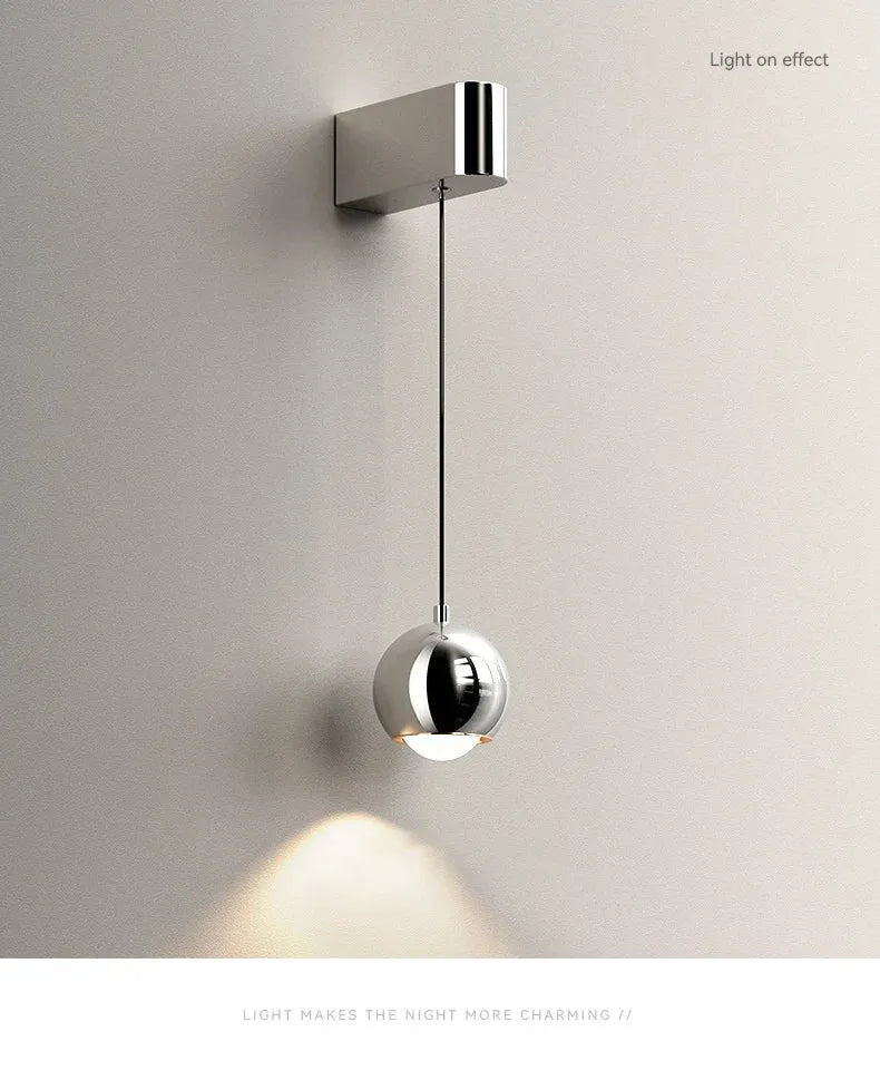 Modern adjustable LED bedside wall lamp for bedroom lighting and decor.