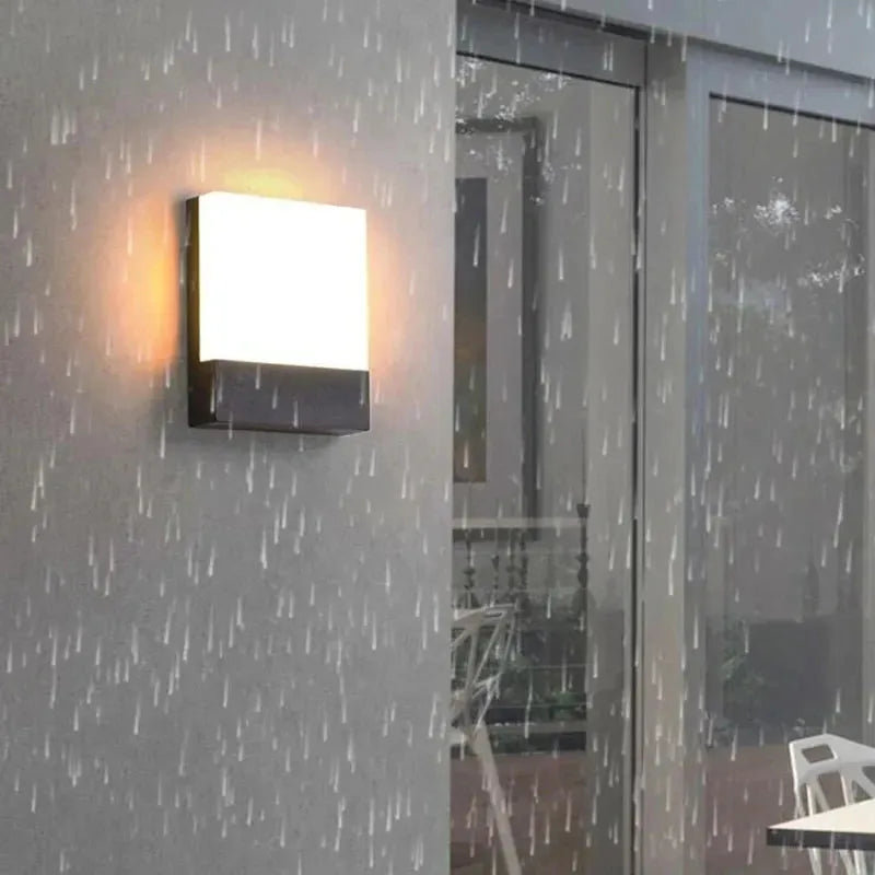 Minimalist ultra-bright outdoor waterproof wall lamp for garden and exterior lighting.