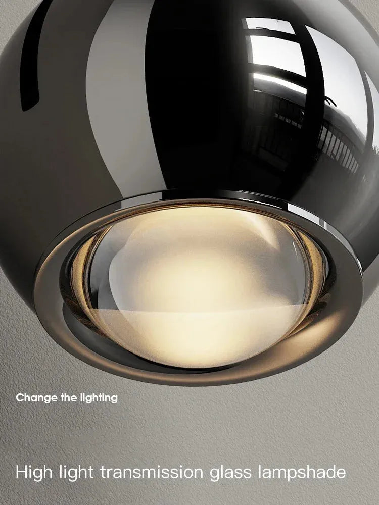 Modern adjustable LED bedside wall lamp for bedroom lighting and decor.