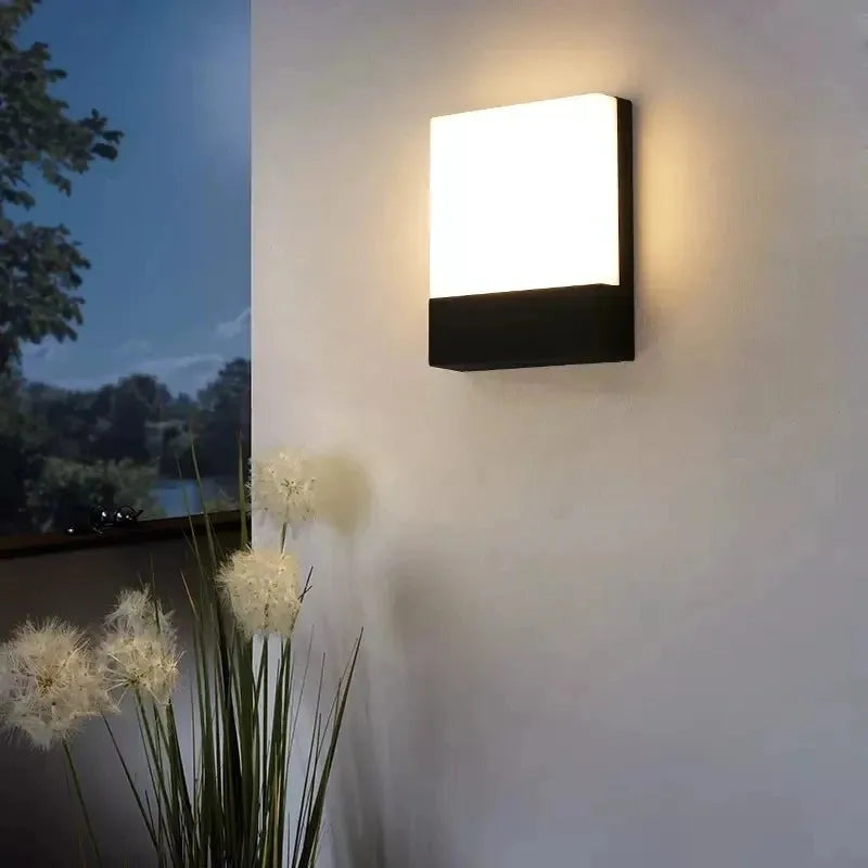 Minimalist ultra-bright outdoor waterproof wall lamp for garden and exterior lighting.