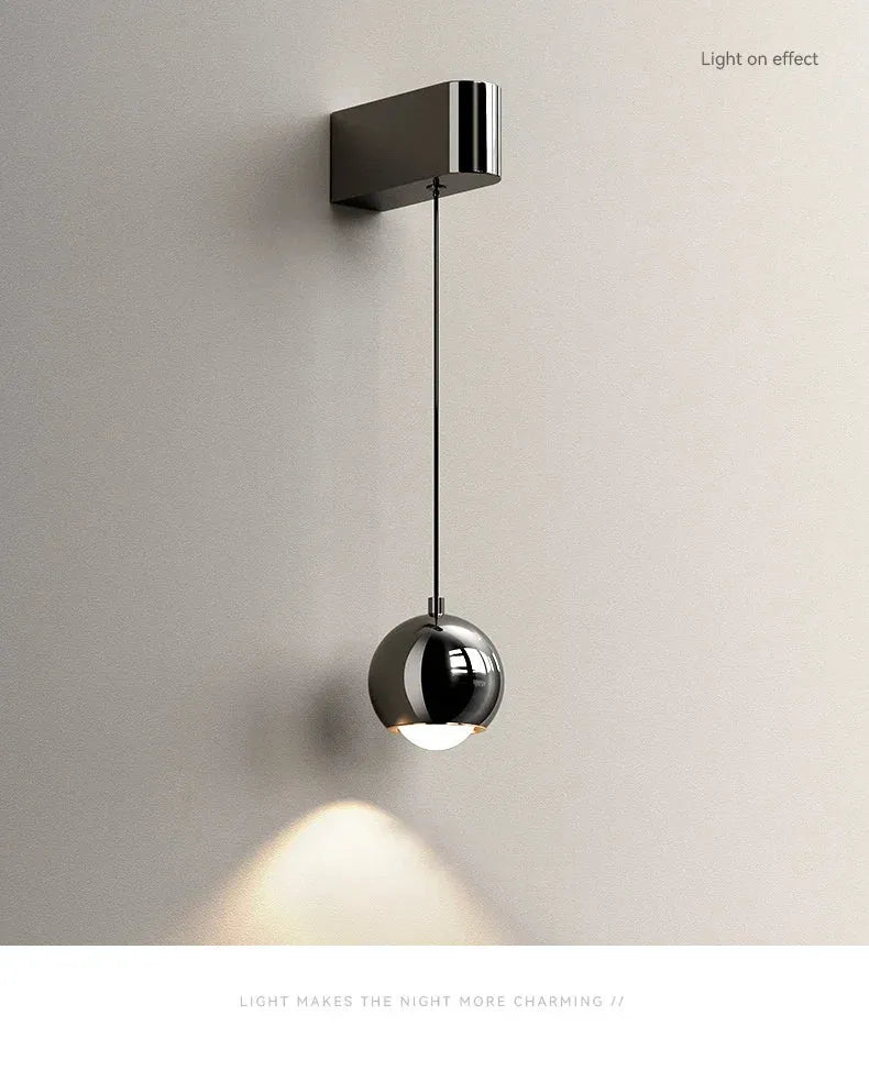 Modern adjustable LED bedside wall lamp for bedroom lighting and decor.