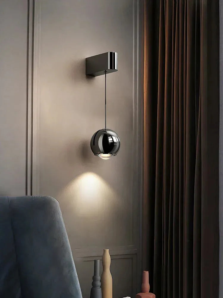 Modern adjustable LED bedside wall lamp for bedroom lighting and decor.