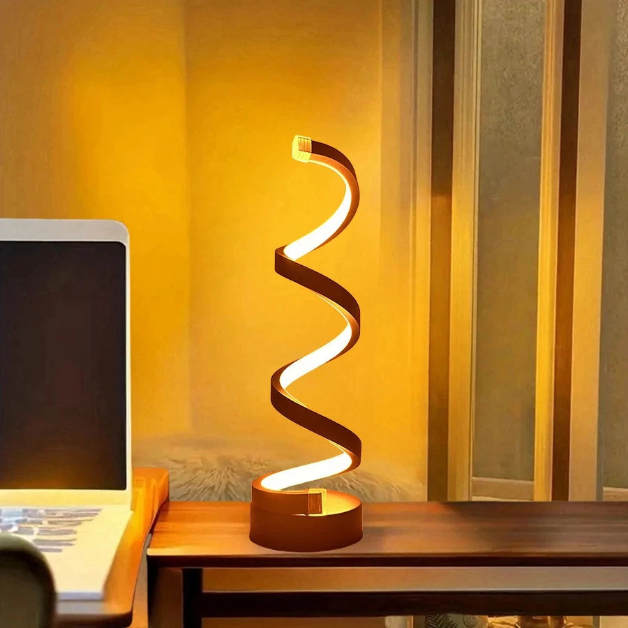 Modern spiral LED table lamp for desk and home lighting decor.
