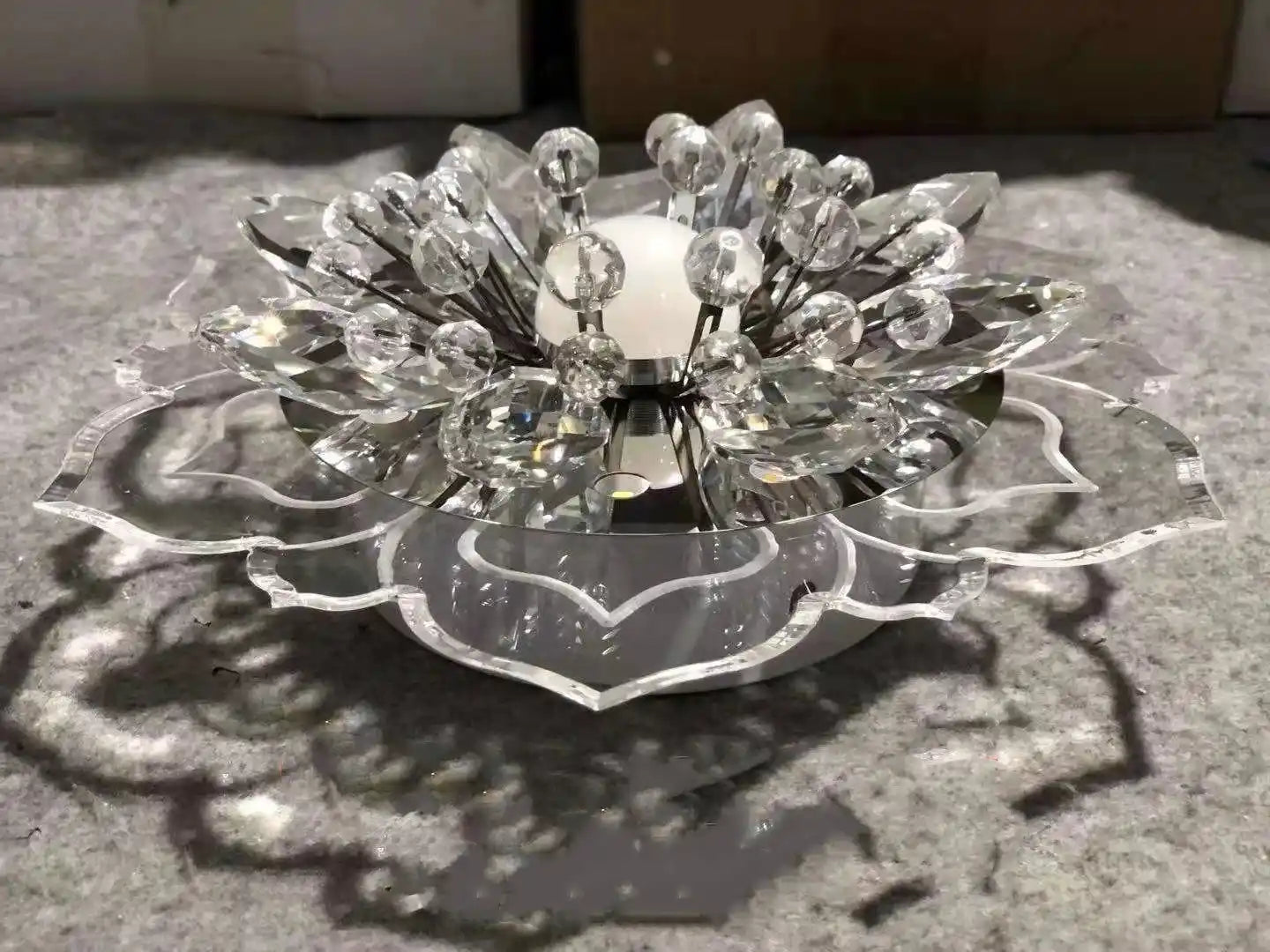 Creative crystal flower LED ceiling light for modern home lighting decor.