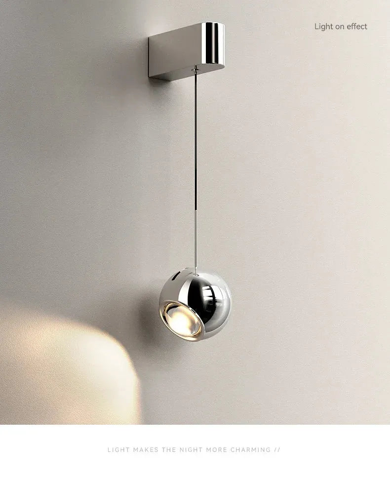 Modern adjustable LED bedside wall lamp for bedroom lighting and decor.