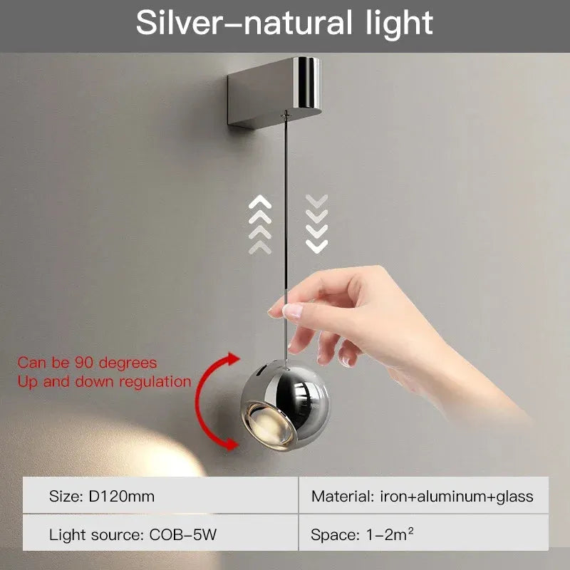 Modern adjustable LED bedside wall lamp for bedroom lighting and decor.