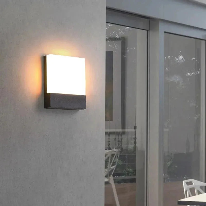 Minimalist ultra-bright outdoor waterproof wall lamp for garden and exterior lighting.